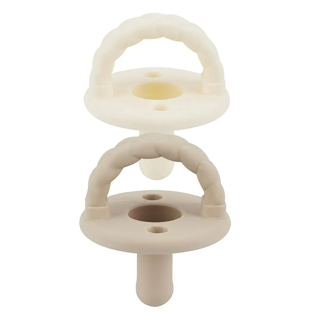 Itzy Ritzy Silicone Pacifiers for Ages 6-18 Months - Itzy Soother Pacifiers Feature Collapsible Handle & Two Air Holes for Added Safety; Set of 2 in Toast & Buttercream, Ages 6-18 Months