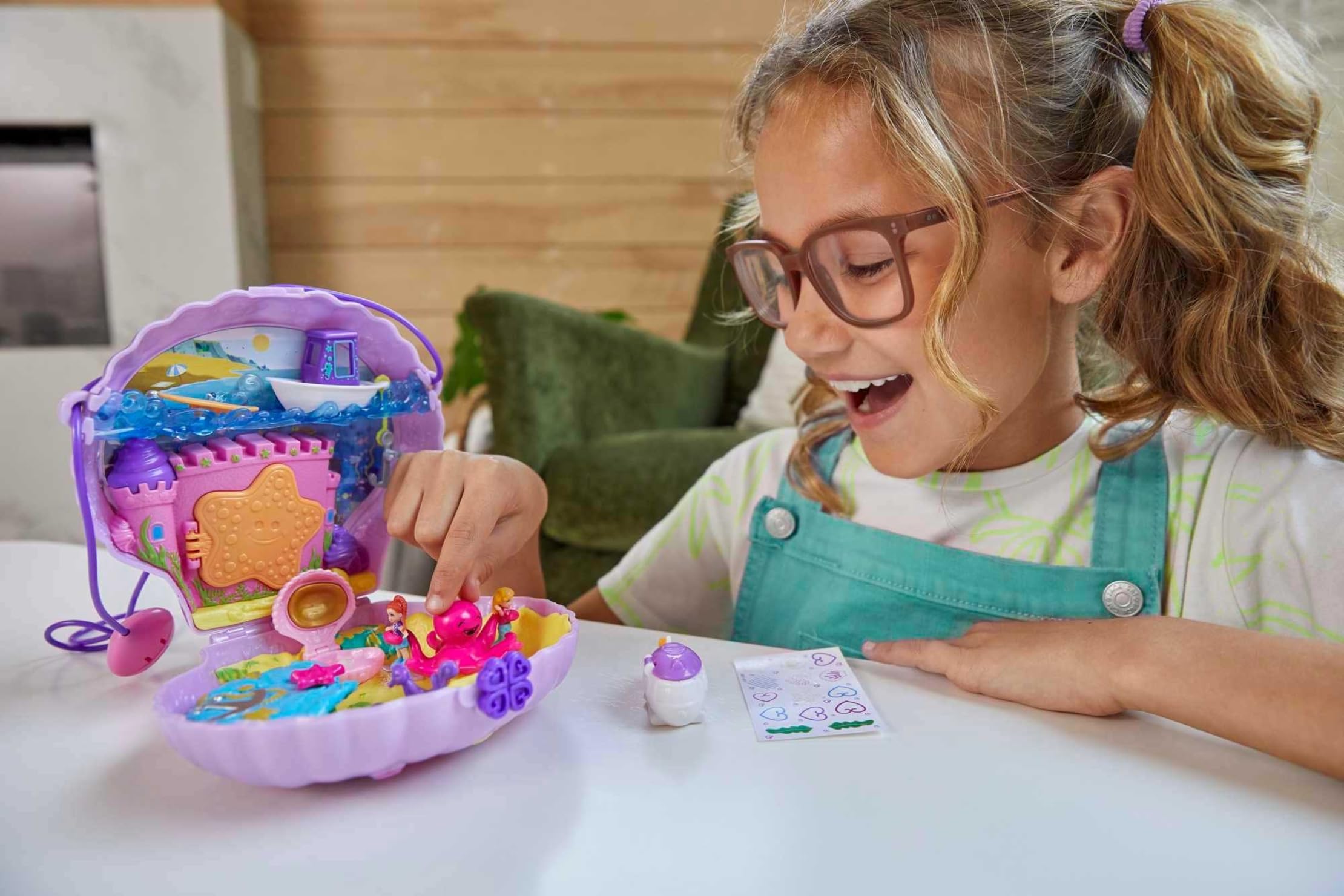 Polly Pocket Tiny Power Seashell Purse Compact with Wearable Strap, Fun Under-The-Sea Features, Micro Polly and Lila Mermaid Dolls, 2 Accessories & Sticker Sheet; for Ages 4 Years Old & Up