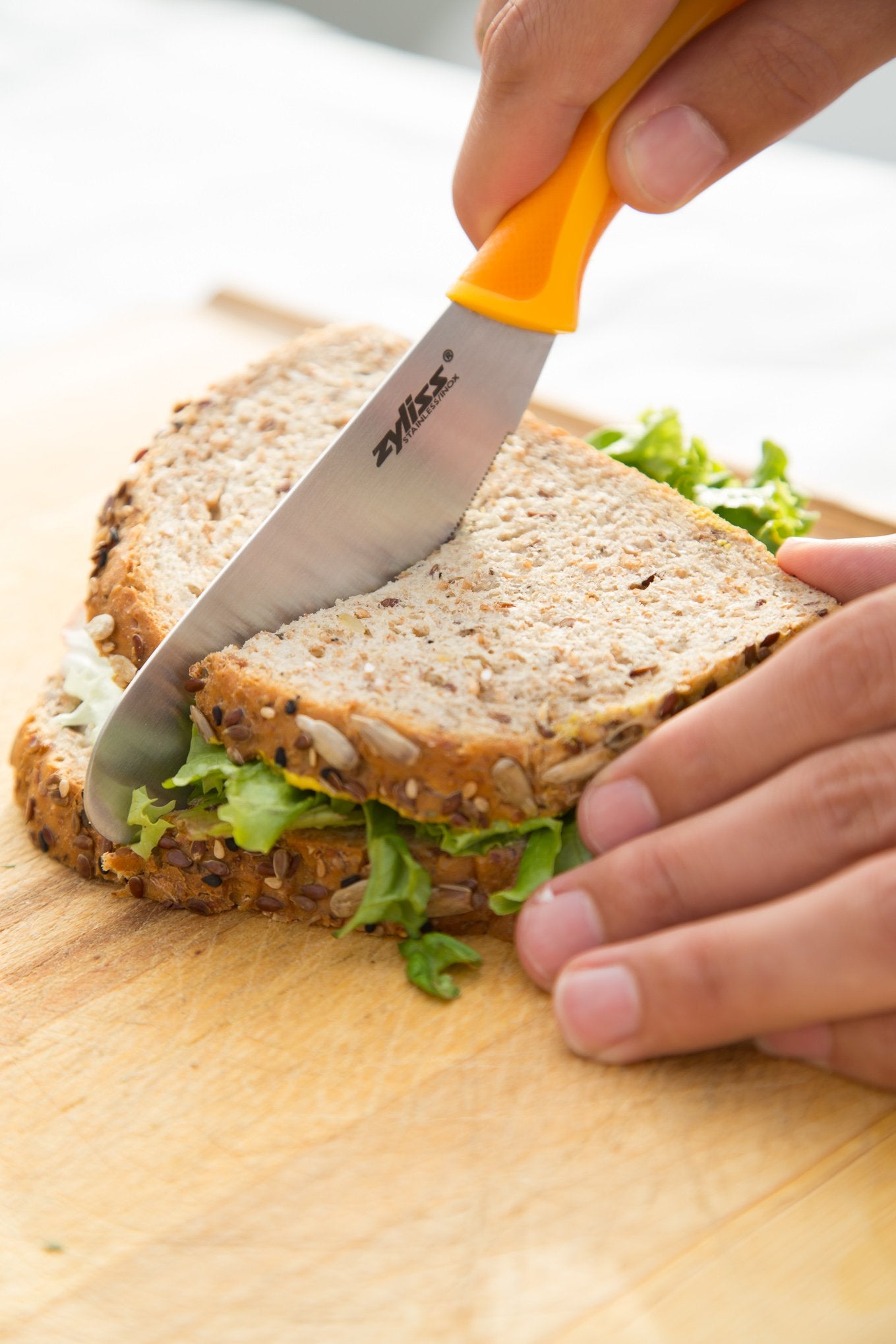 Zyliss Sandwich Knife & Condiment Spreader - Sandwich Spreader Knife for Butter, Cream Cheese, & Jellies - Butter for Bagels & Toast - Orange