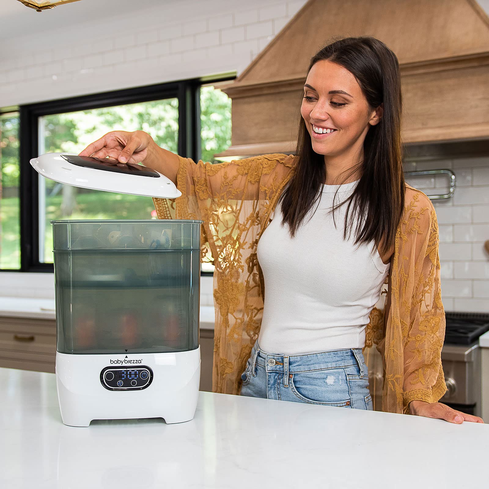 Baby Brezza Bottle Sterilizer and Dryer Advanced – 33% Faster - Largest Capacity Steam Sanitizer - Universal Sterilization Machine for All Bottles + Pump Parts - HEPA Air Filter
