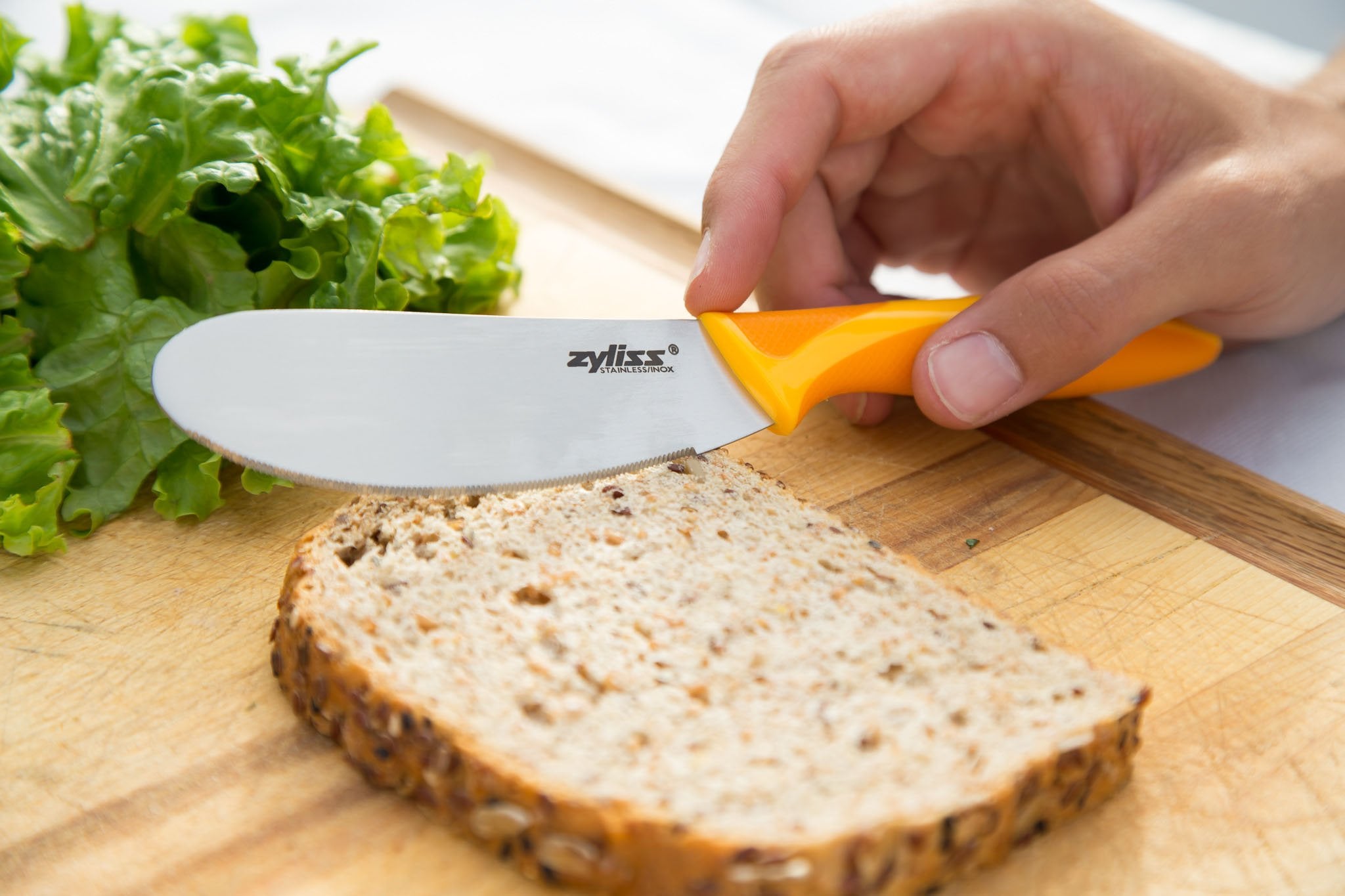 Zyliss Sandwich Knife & Condiment Spreader - Sandwich Spreader Knife for Butter, Cream Cheese, & Jellies - Butter for Bagels & Toast - Orange